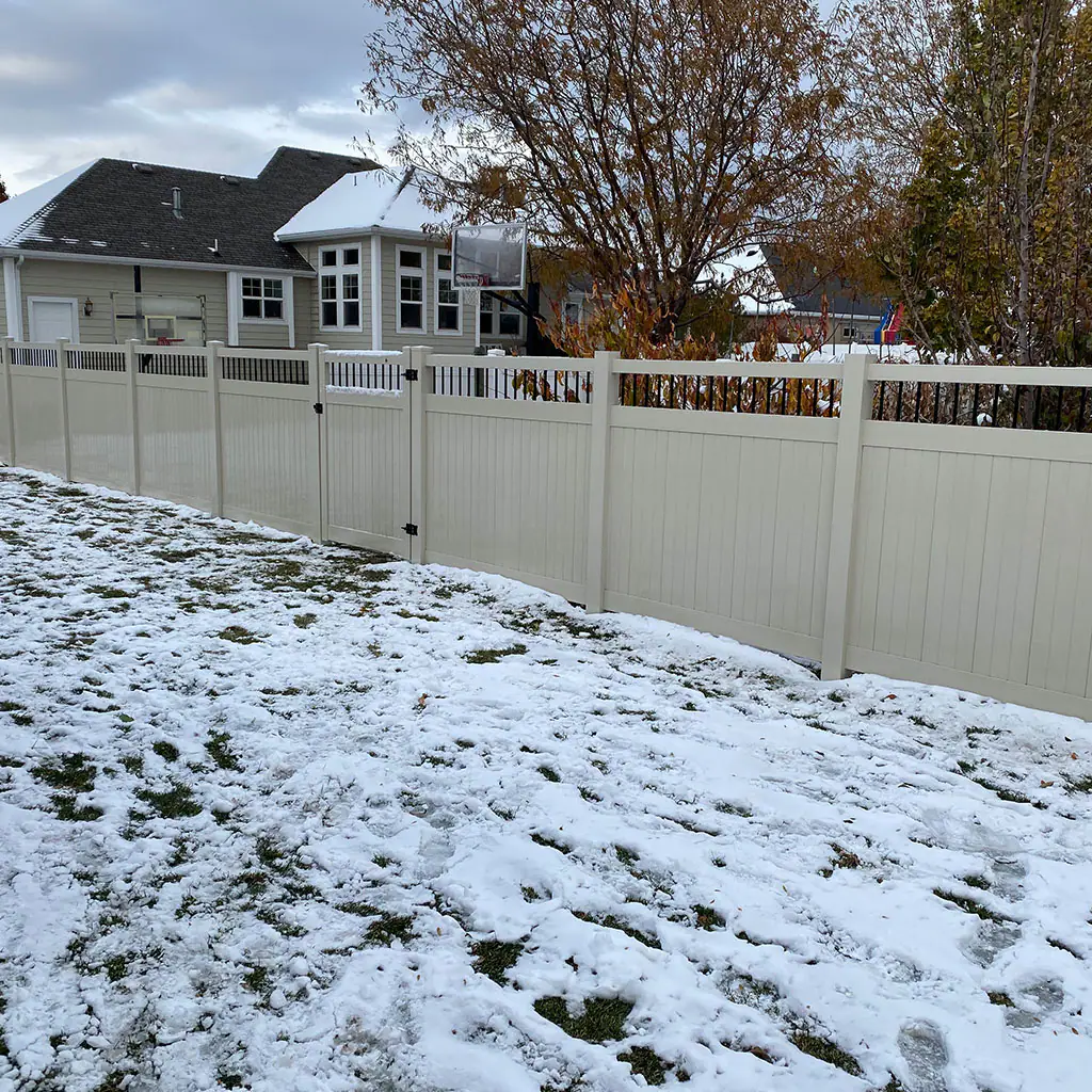 Brown privacy fence installed along a Utah residential property